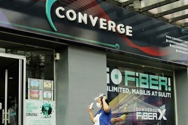 Converge cuts capex as typhoons disrupt rollout