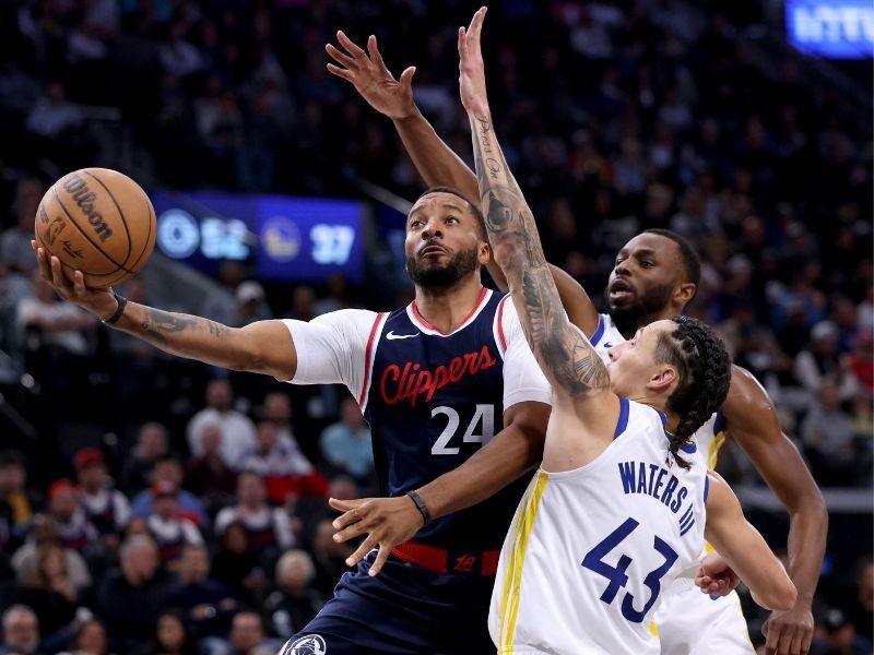 Clippers upset Warriors; Lillard saves Bucks