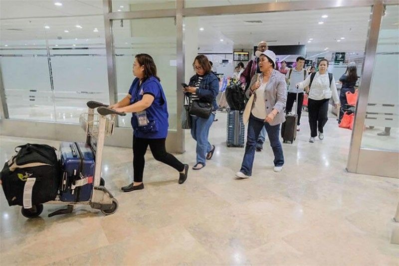 75 OFWs back from Lebanon