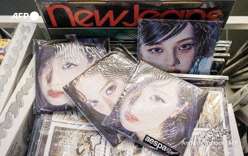 K-pop fans take aim at CD, merch waste