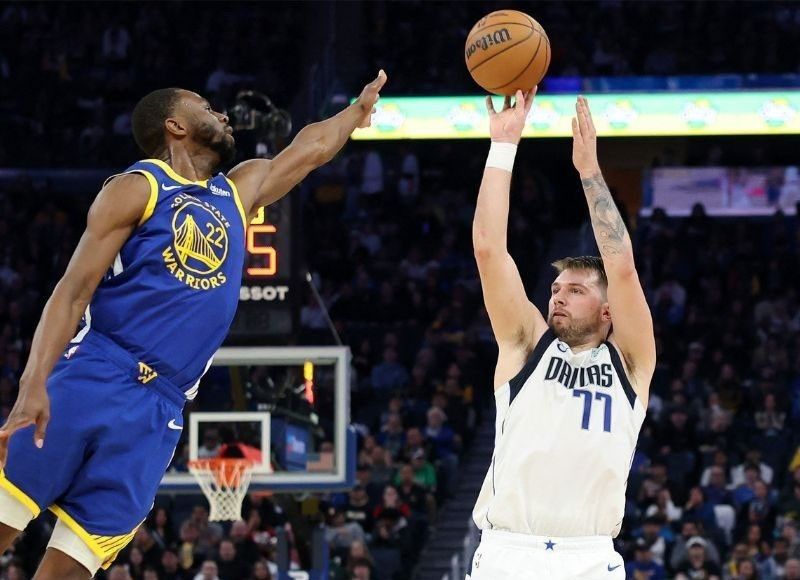 Doncic triple-double leads Mavs over Warriors in shootout