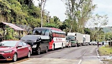 Photo from LTO Bicol shows the traffic congestion on Andaya Highway in Camarines Sur due to ongoing road repairs. A 30-minute stop-and-go scheme is being implemented to ease the traffic slowdown.