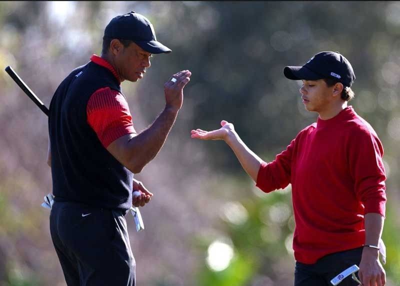 Tiger teams up with son Charlie in Orlando