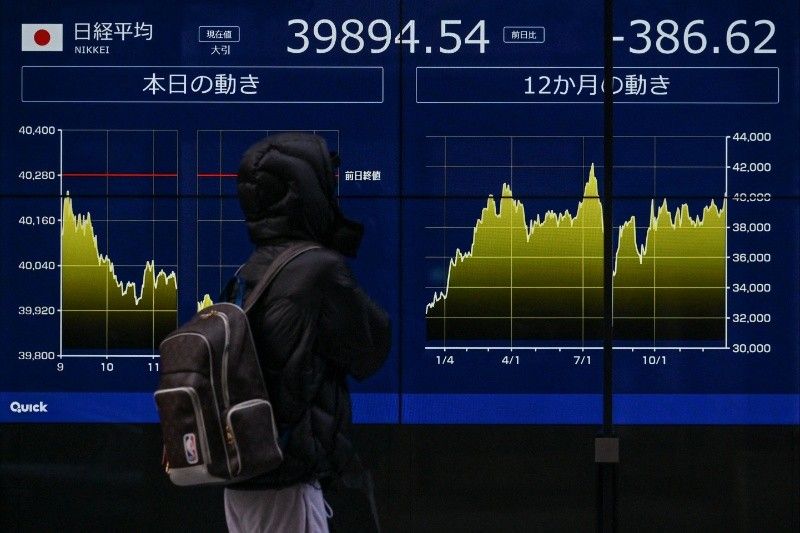 Asian stocks begin year on cautious note