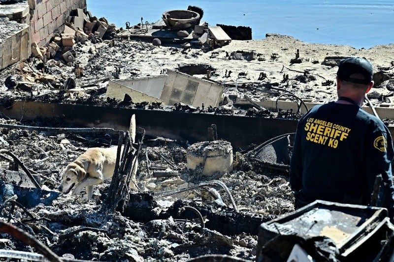 Death toll from Los Angeles fires rises, with dangerous winds incoming