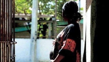 Fourteen-year-old Maria (not her real name) stays at home in Payatas, Quezon City after she stopped attending school due to her pregnancy, in this photo taken yesterday.