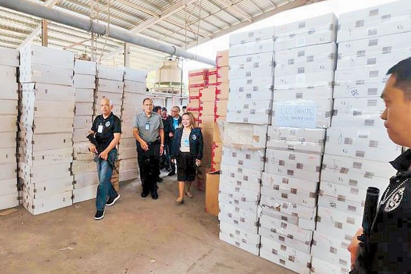 BOC men eyed in resale of P270 million seized cigarettes