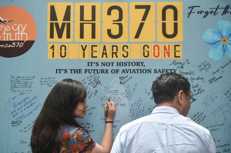 Families of MH370 victims in China seek end to decade of 'torment'