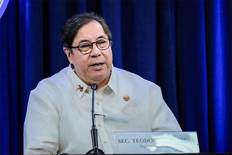 DOH secretary under fire for posing with tobacco execs