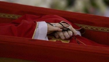 Pope Francis in his open coffin in the Vatican, April 21, 2025.