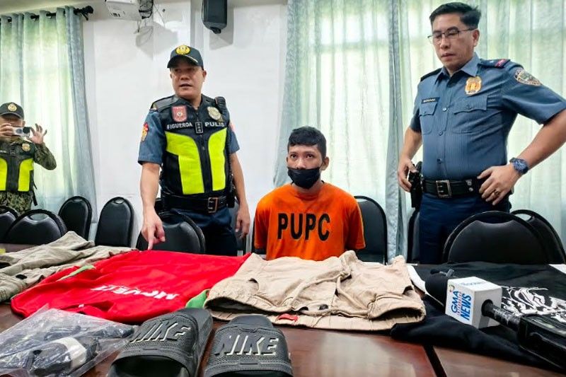 Suspect in store manager slay arrested