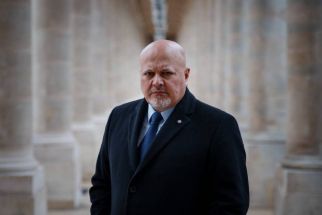 International Criminal Court Prosecutor Karim Khan poses during an interview with AFP at the Cour d'Honneur of the Palais Royal in Paris on February 7, 2024.