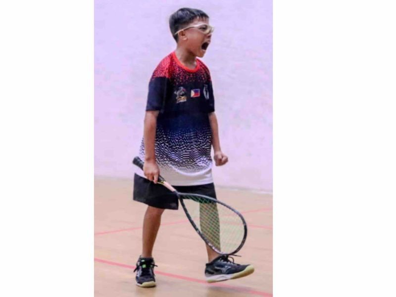 Street kid wins gold in squash