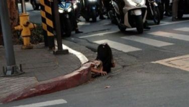 Viral: Mystery woman emerges from Makati sewer