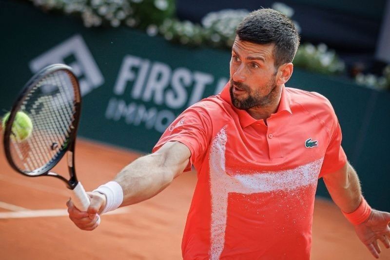 Djokovic downs Zverev, sets up clash with Sinner