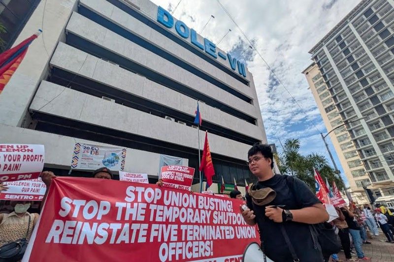 Labor groups protest MetroWear shutdown