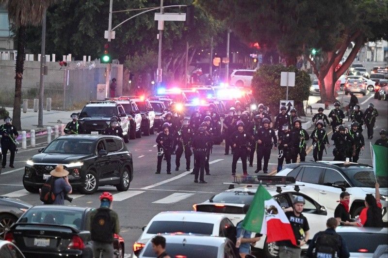 Nighttime curfew in LA as Trump vows to 'liberate' city