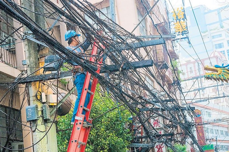 Manila fights ‘spaghetti’ wires