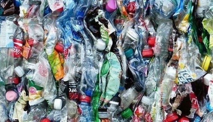 Shredded plastic bottles used for City road repair