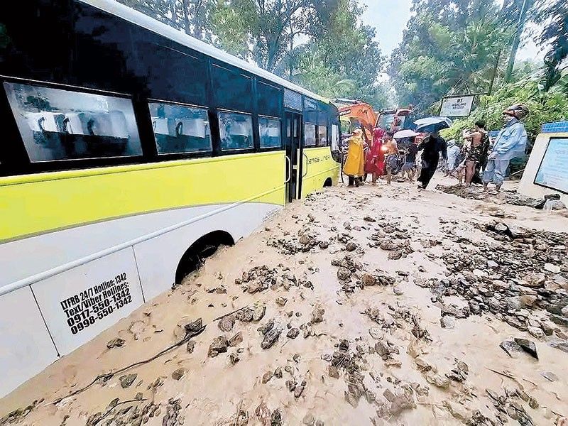 Typhoons leave 16 roads impassable