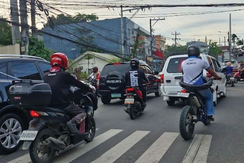 Barangay captain cited for driving with no helmet