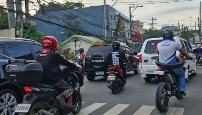 Barangay captain cited for driving with no helmet