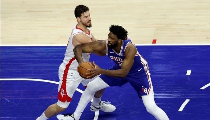Embiid pulls off triple-double as Sixers shoot down Rockets in overtime