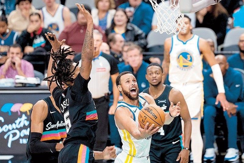 Curry powers Warriors, Wemby stars for Spurs