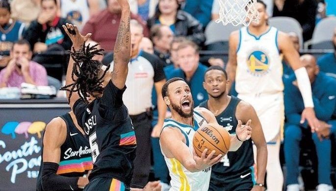 Curry powers Warriors, Wemby stars for Spurs