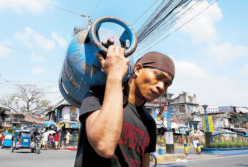 Marcos suspends excise tax on LPG, kerosene