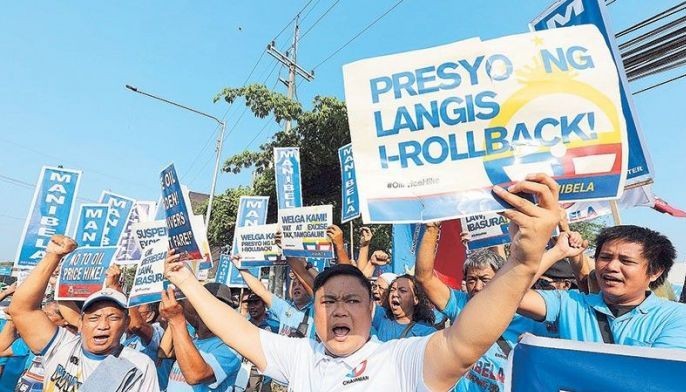 Protesters mourn death of motor taxi rider