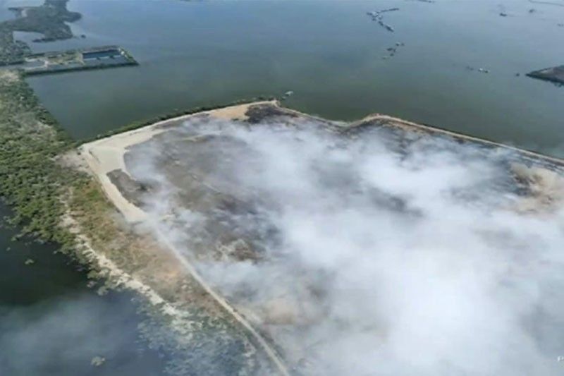 Faster containment seen in Navotas landfill fire