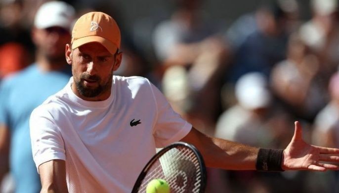 Djokovic fights through tough Roland Garros opener