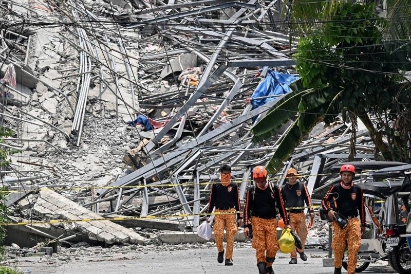 2 city execs suspended over building collapse