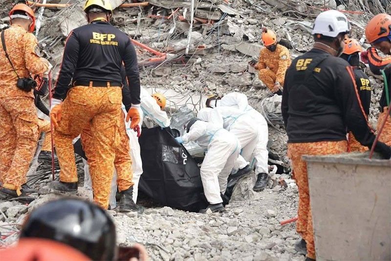 Death toll sa gumuhong 9-storey condo-hotel, 28 na