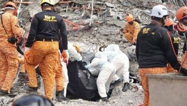 Death toll sa gumuhong 9-storey condo-hotel, 28 na