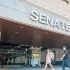 Senate employees leave the Senate building in Pasay at the end of the workday yesterday.