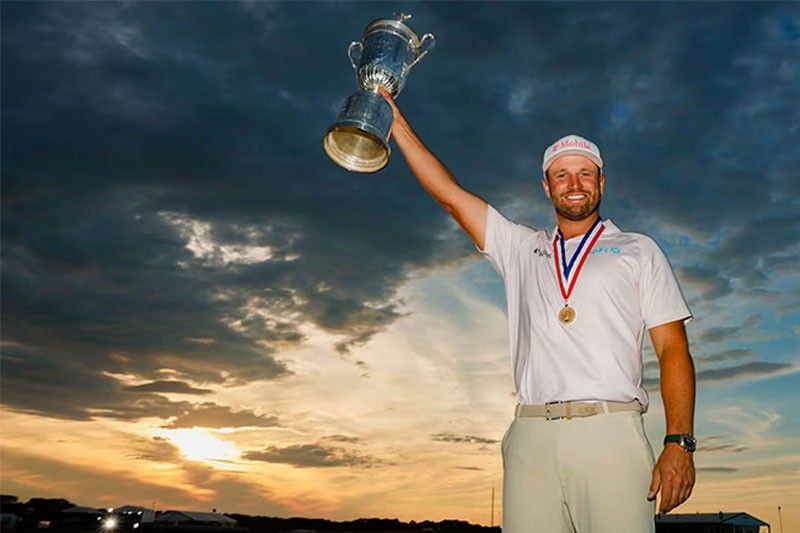 Hecklers can’t stop Clark triumph