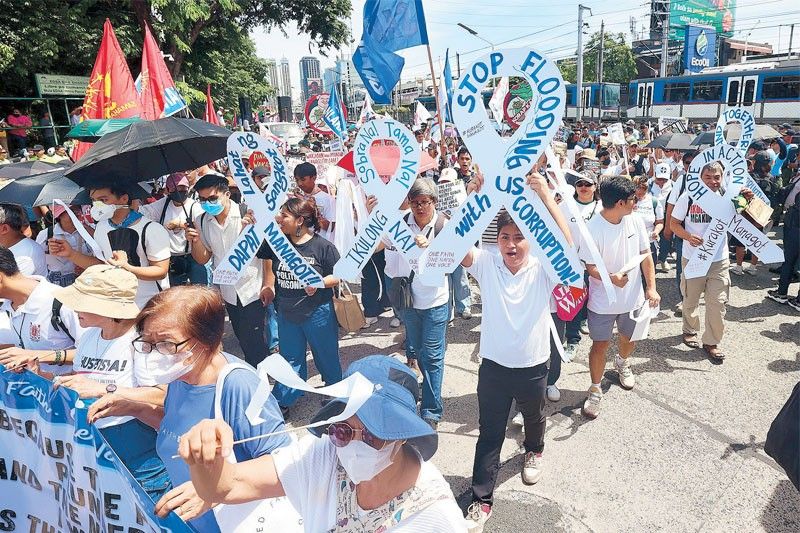 Marchers demand accountability in corruption