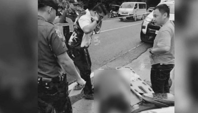 Cop in policeman&rsquo;s slay surrenders