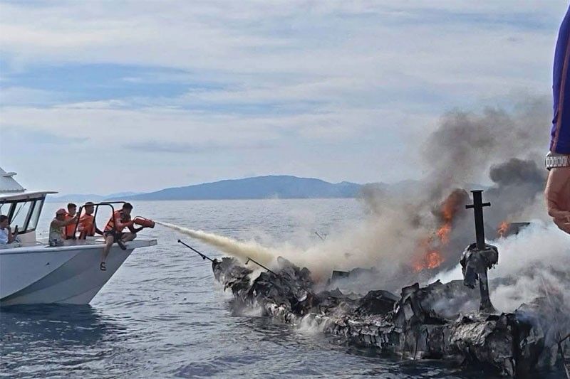 Fishermen, PCG rescue 4 crewmen from burning yacht