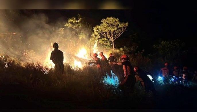 PCG water cannons save lighthouse station from grass fire