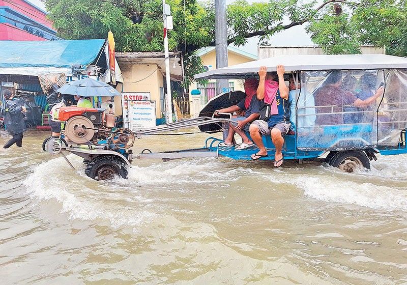 High tide, rain inundate 149 Bulacan villages