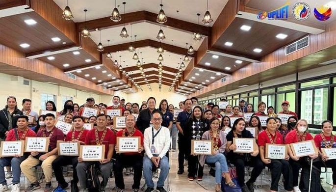 52 distressed OFWs get financial aid