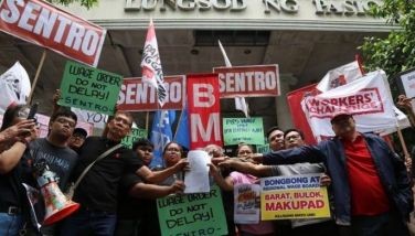 Labor groups: Lift wage hike injunction