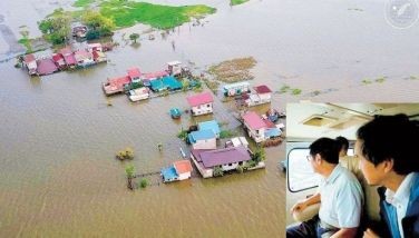Marcos blames heavy rain for massive flooding