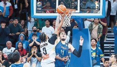 Kai Sotto blocks Abdullah Olajuwon to seal Gilas&acirc;?? win over Jordan.