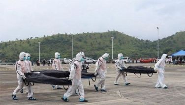 ‘Mass grave’ sa ferry fire victims hinukay, 41 pang bangkay narekober