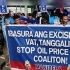 Members of transport group Manibela stage a protest at Philcoa in Quezon City yesterday, marking the first day of their planned two-day transport strike.