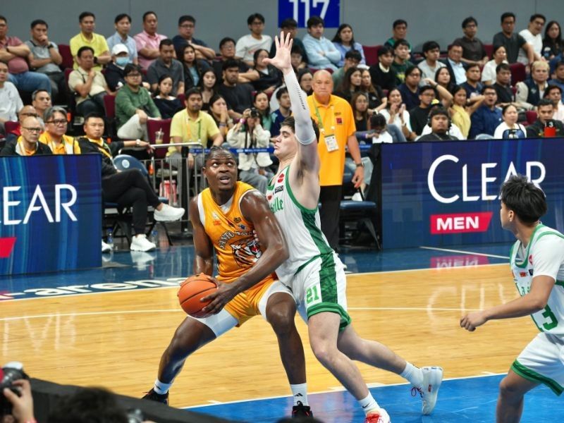 Tigers hold off Archers for first win
